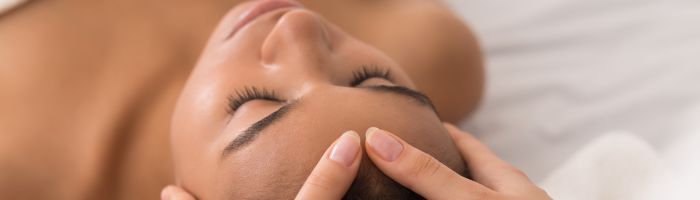 A woman receiving a facial treatment here at Medi Aesthetics.