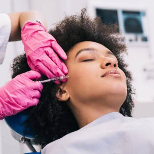 Woman receiving botox injections at Medi Aesthetics, Clapham Common.