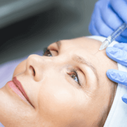 woman getting injections for a non surgical facelift at medi aesthetics
